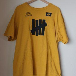 UNDEFEATED YELLOW / BLACK TEE SHIRT JERSEY STYLE MENS